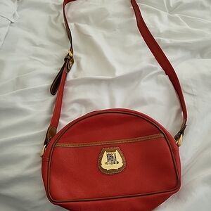 Elegant Red Crossbody Bag with Gold Accents